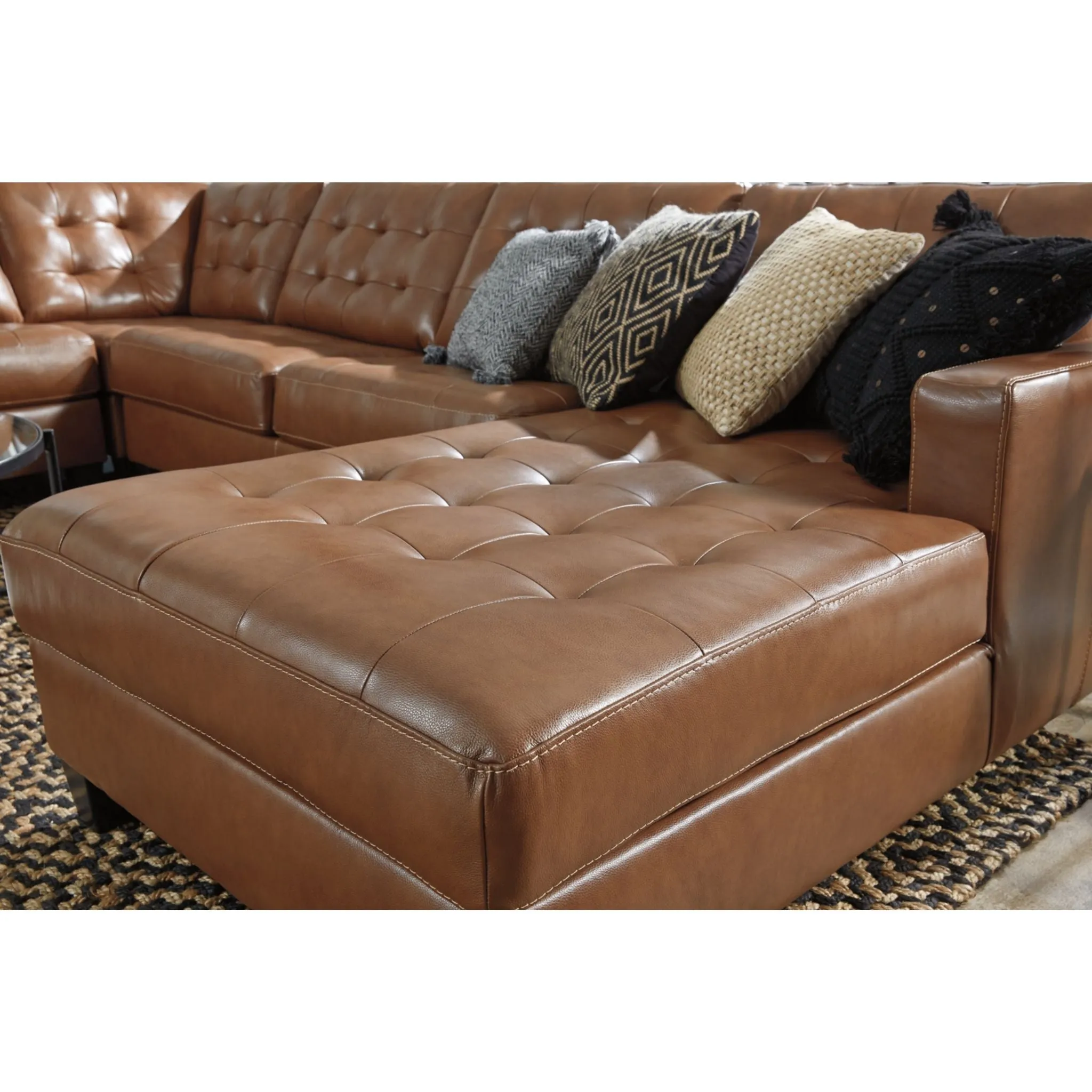 Baskove 4 Piece Sectional with Chase