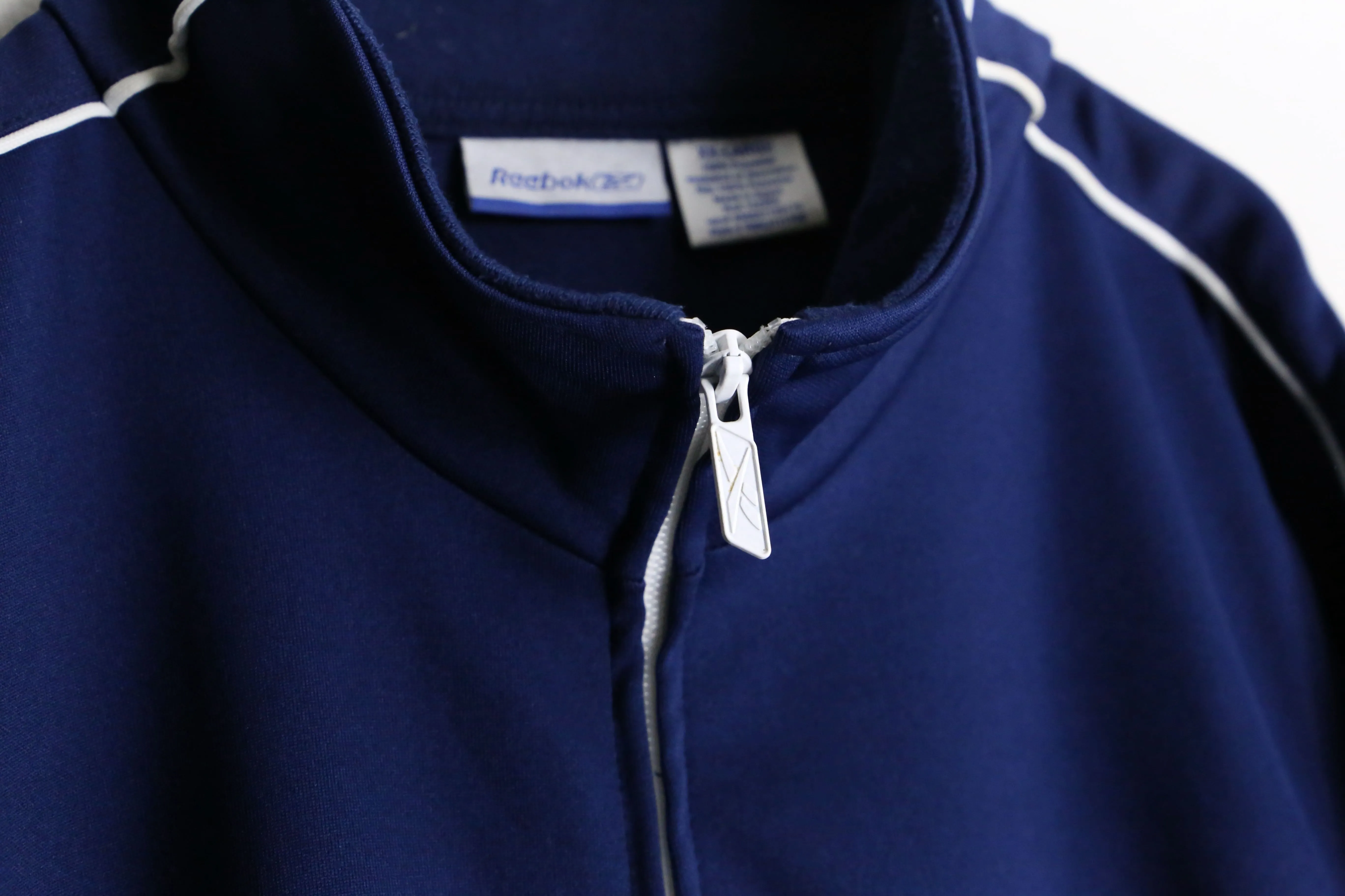 "Reebok" navy color line design track jacket