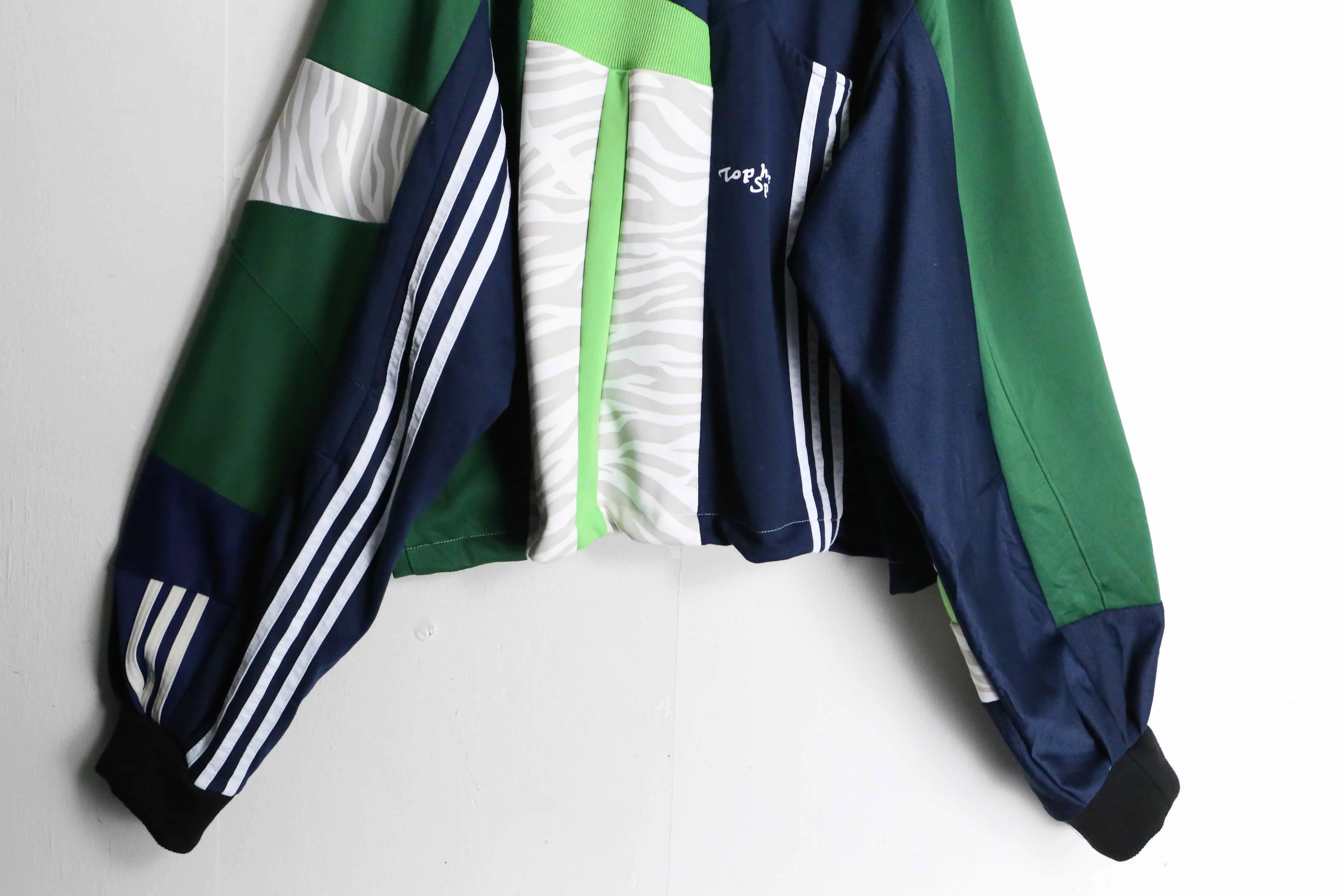 "Re:make"green × navy color random track jacket