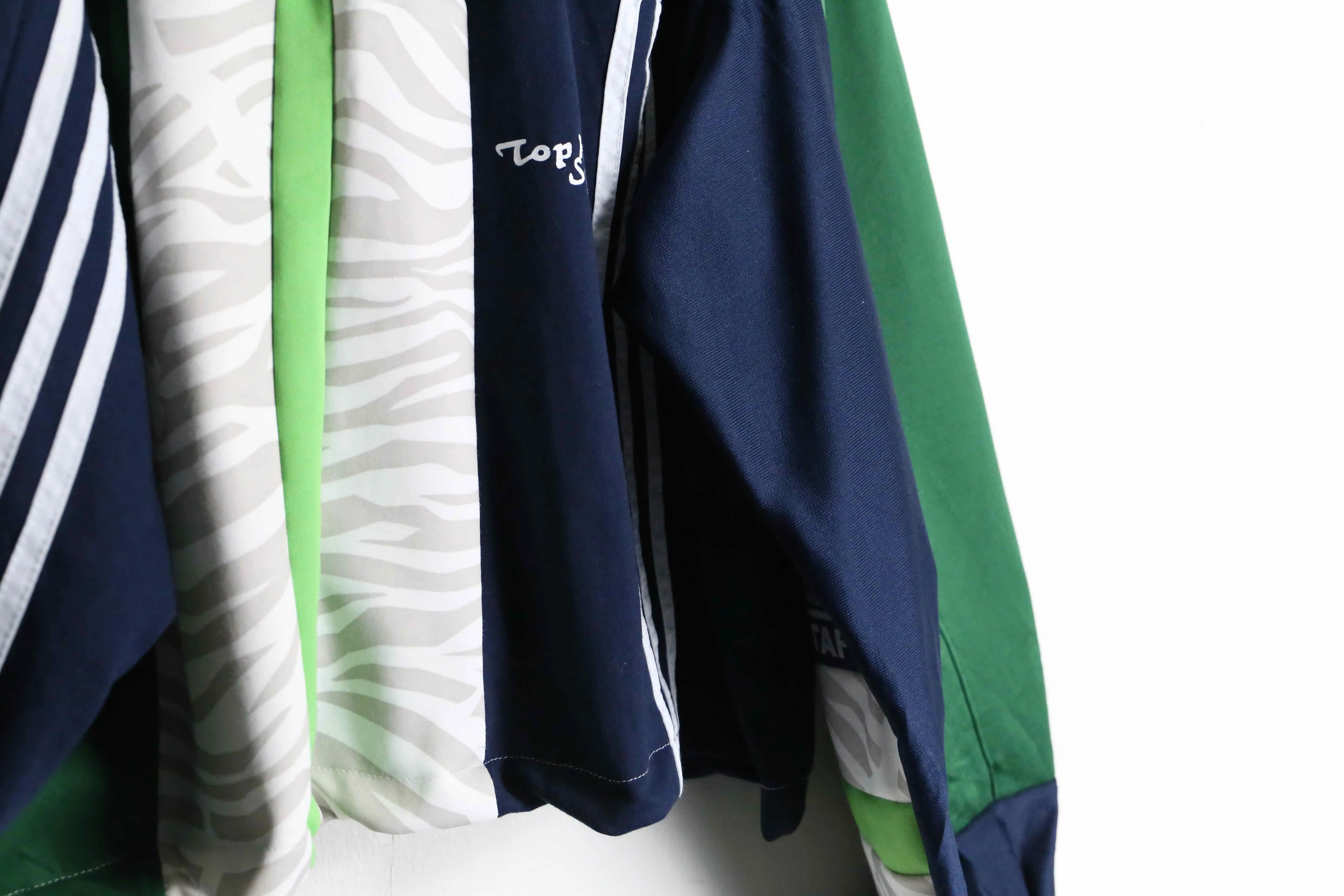 "Re:make"green × navy color random track jacket